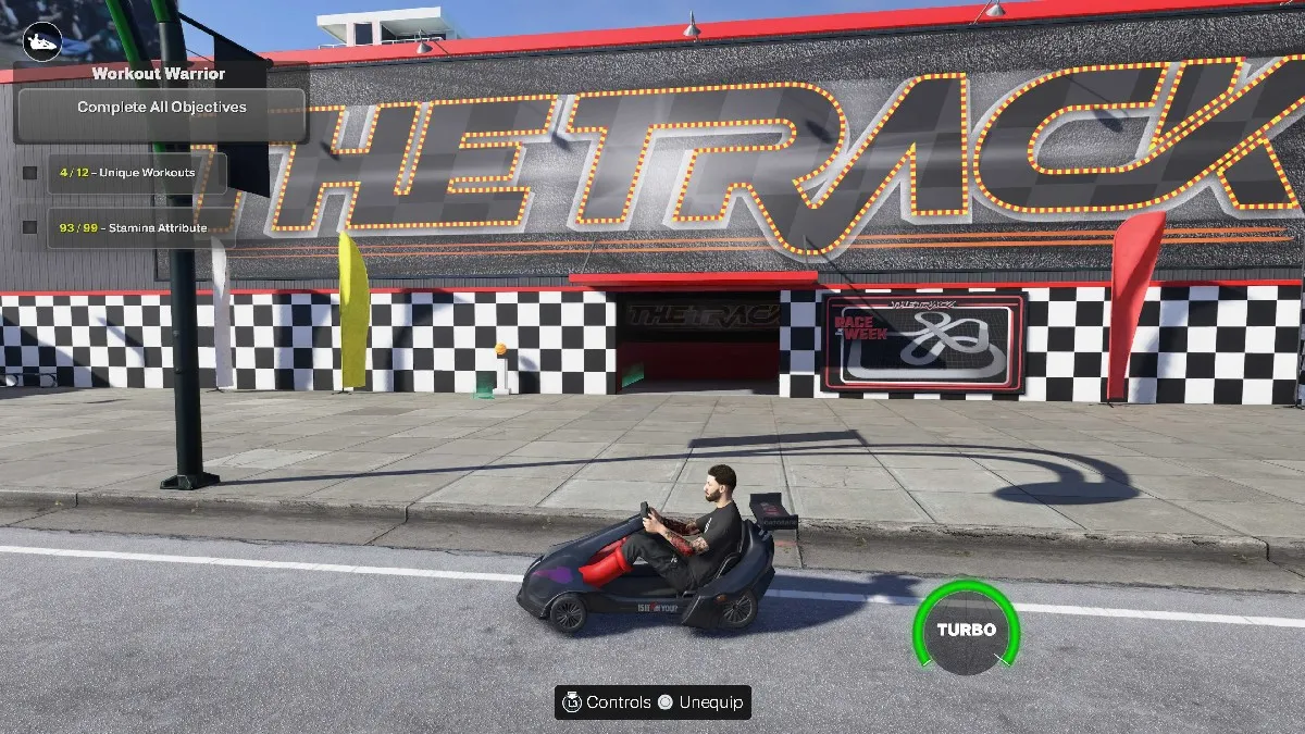 The Track in NBA 2K25, with the player sitting in a tiny go-kart on the street