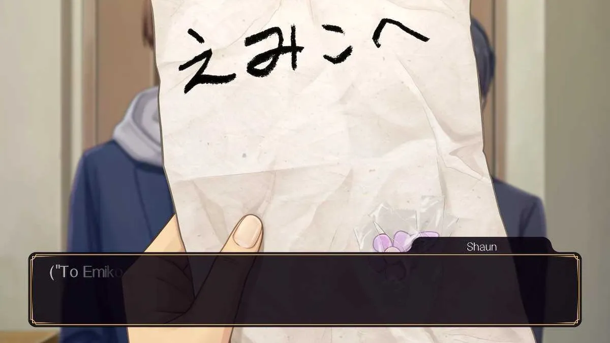 A note with a hair clip attached that says "To Emiko" in Emio: The Smiling Man