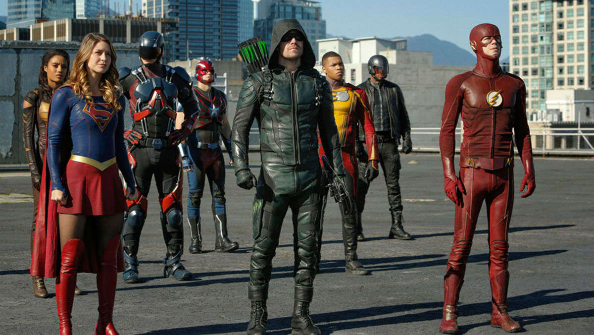 Characters from the Arrowverse standing together.