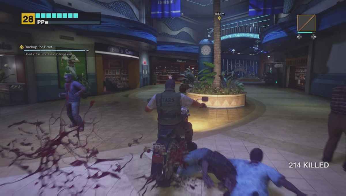 Dead Rising Deluxe Remaster, Frank West riding a motorbike through a mall, running over zombies. 