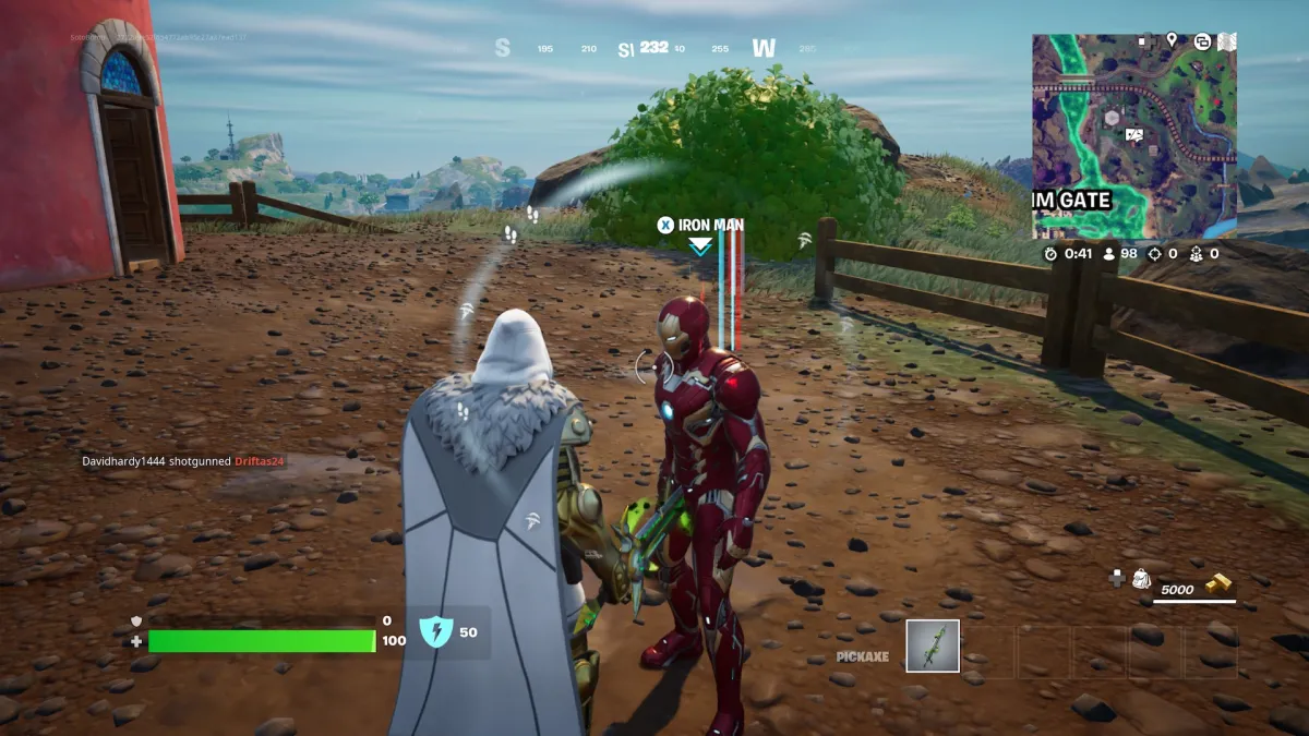 The Iron Man NPC in Fortnite as part of an article about how to hit opponents with stark weapons for a total accumulated distance.