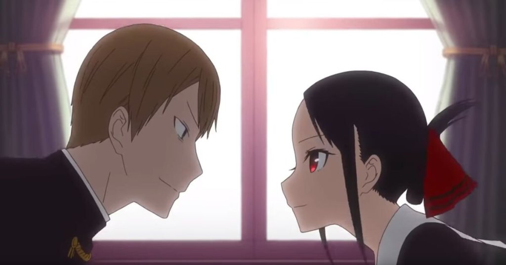 Miyuki and Kaguya lean in close together in front of a window as part of an article about anime's 10 greatest couples ever.