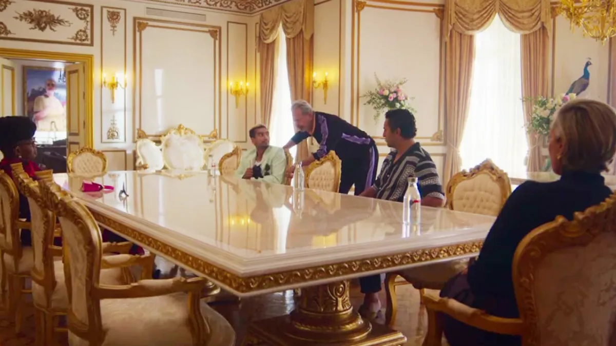 Netflix's Kaos, with Jeff Goldblum as Zeus and several other gods, sitting round a long table. 