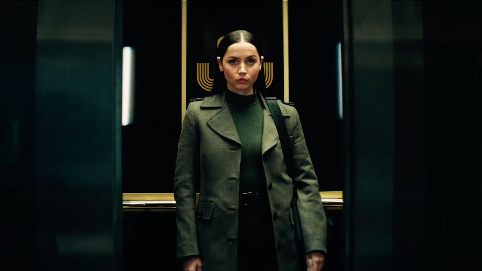 Eve Macarro in an elevator in the Ballerina trailer