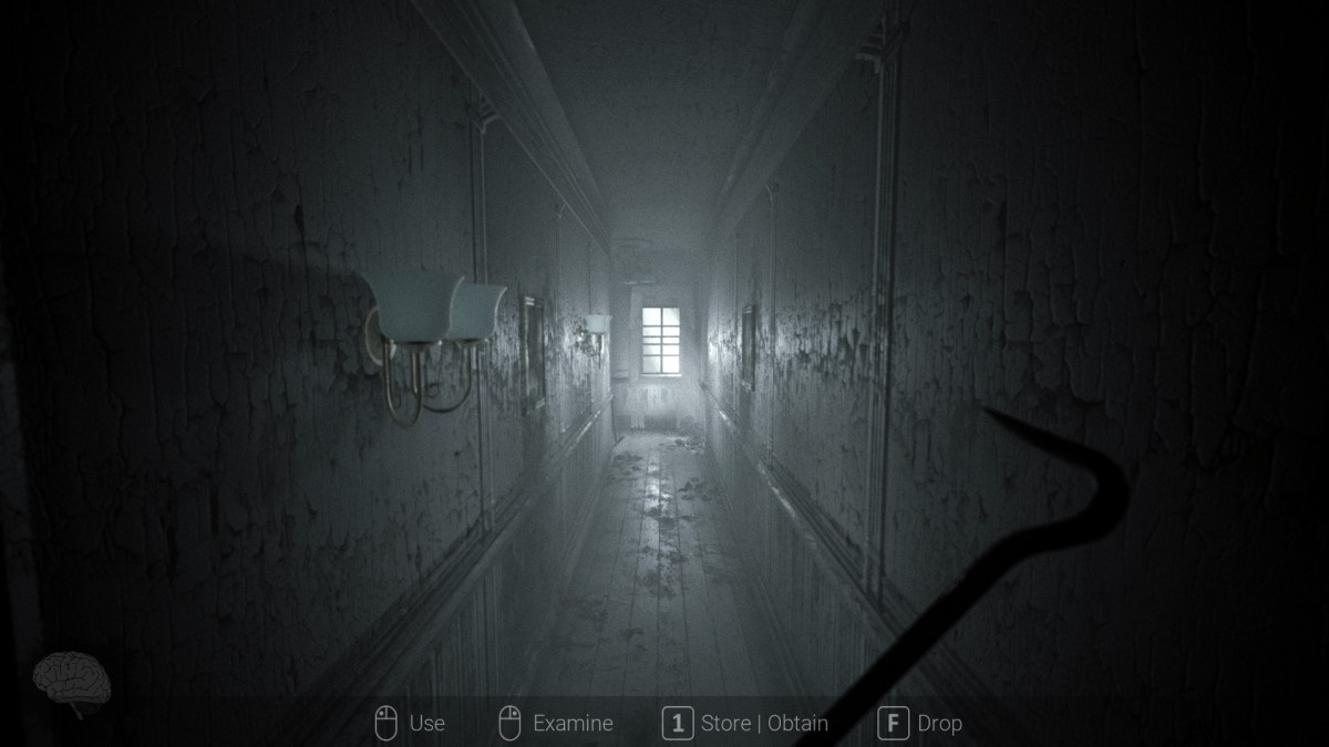 First Person View, holding crowbar in a spooky corridor as part of an article about the best horror games