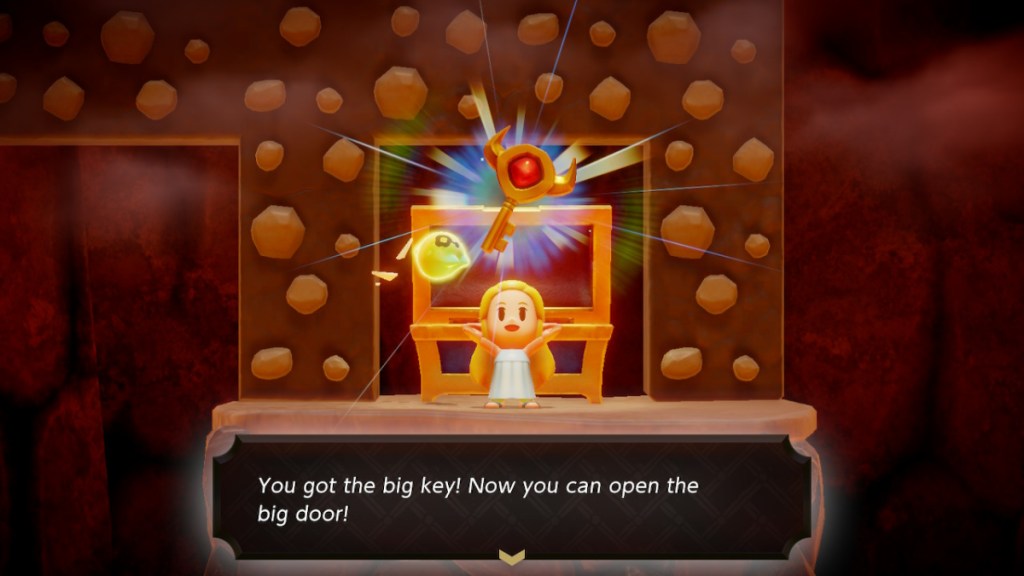 Zelda picks up the boss key of Eldin Temple