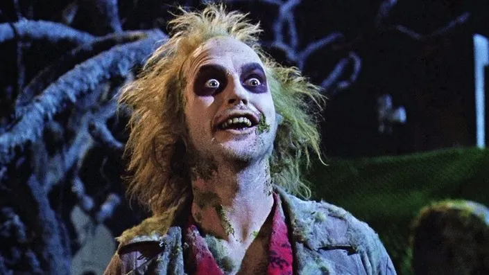 Michael Keaton in Beetlejuice as part of an article about the best TIm Burton movies.