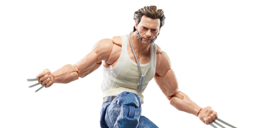 Wolverine in a white tank top draws his claws