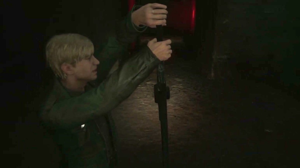 Silent Hill 2, James picking up Pyramid Head's Great Knife. 