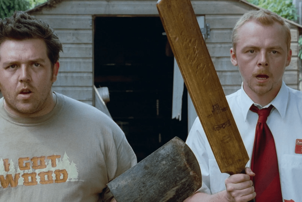 Ed and Shaun ready their weapons  as part of an article about the best horror movies on streaming.