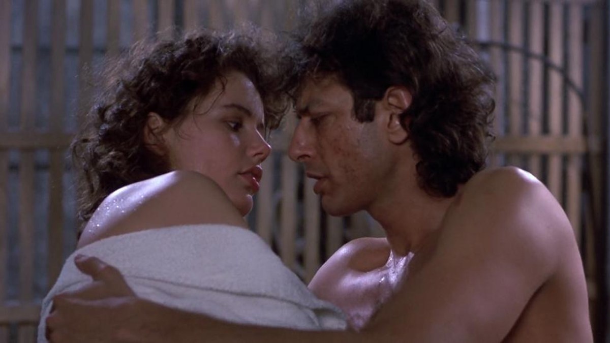 Geena Davis and Jeff Goldblum in The Fly, about to kiss. 