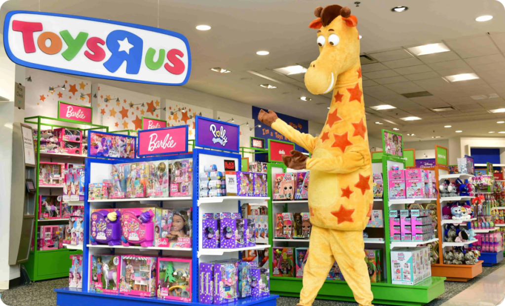 Geoffrey in front of a toy display