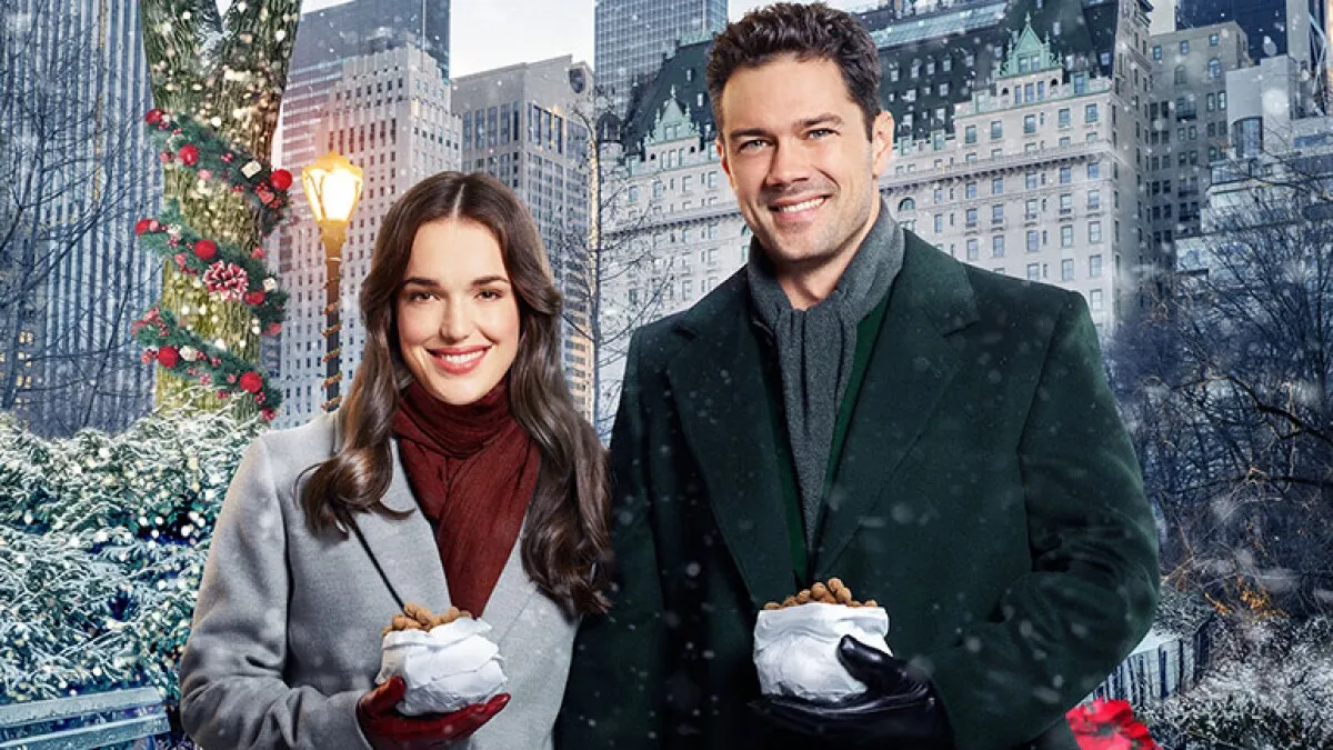 Elizabeth Henstridge and Ryan Paevey stand next to each other in a wintry Central Park