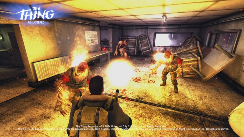 The Thing: Remastered, a character using a flamethrower on enemies.